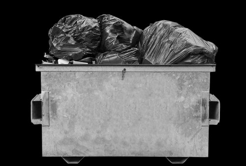 Recycling bins and labelled containers in a sustainable rubbish area